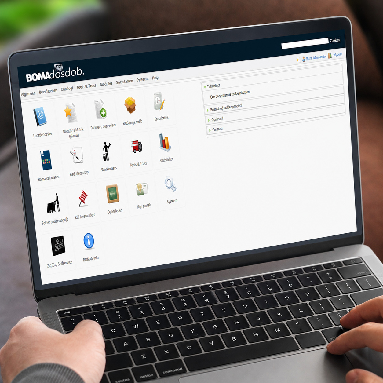 Cleaner looking at an iPad displaying the digital cleaning management tool DosDob.